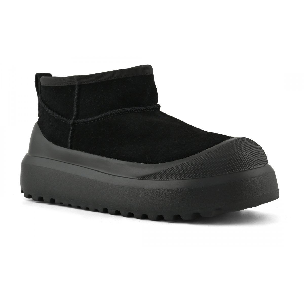 Bottes en daim à semelle monobloc