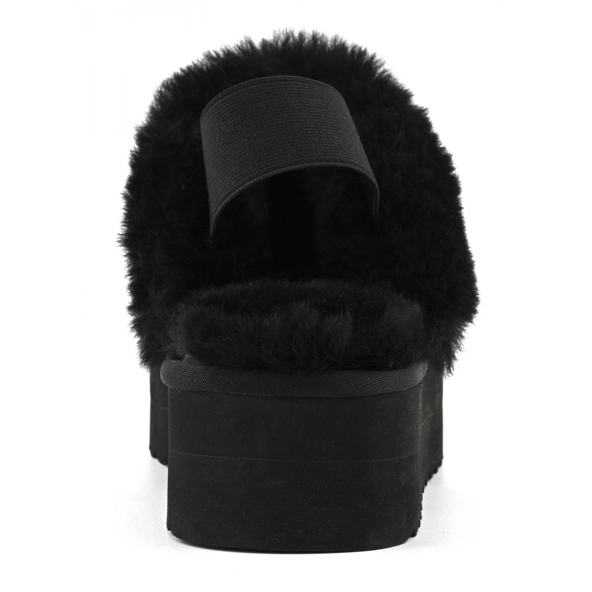 Chaussons à plateforme en peau de mouton